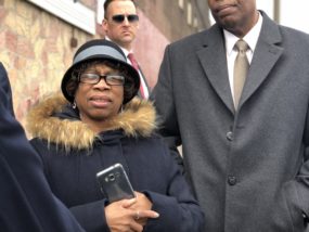 Block Captain, Arletha Pickens, listens in with Councilman Clarke